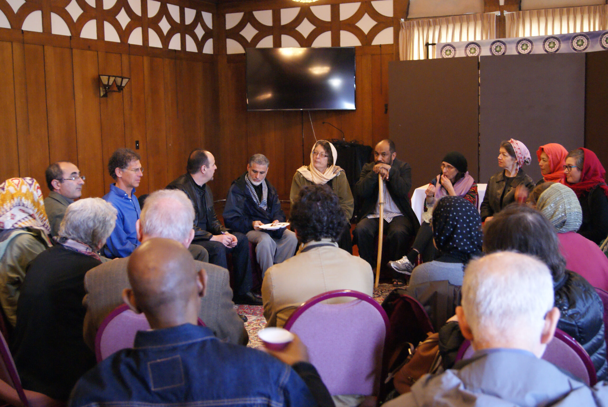 A group of people sitting in a circle