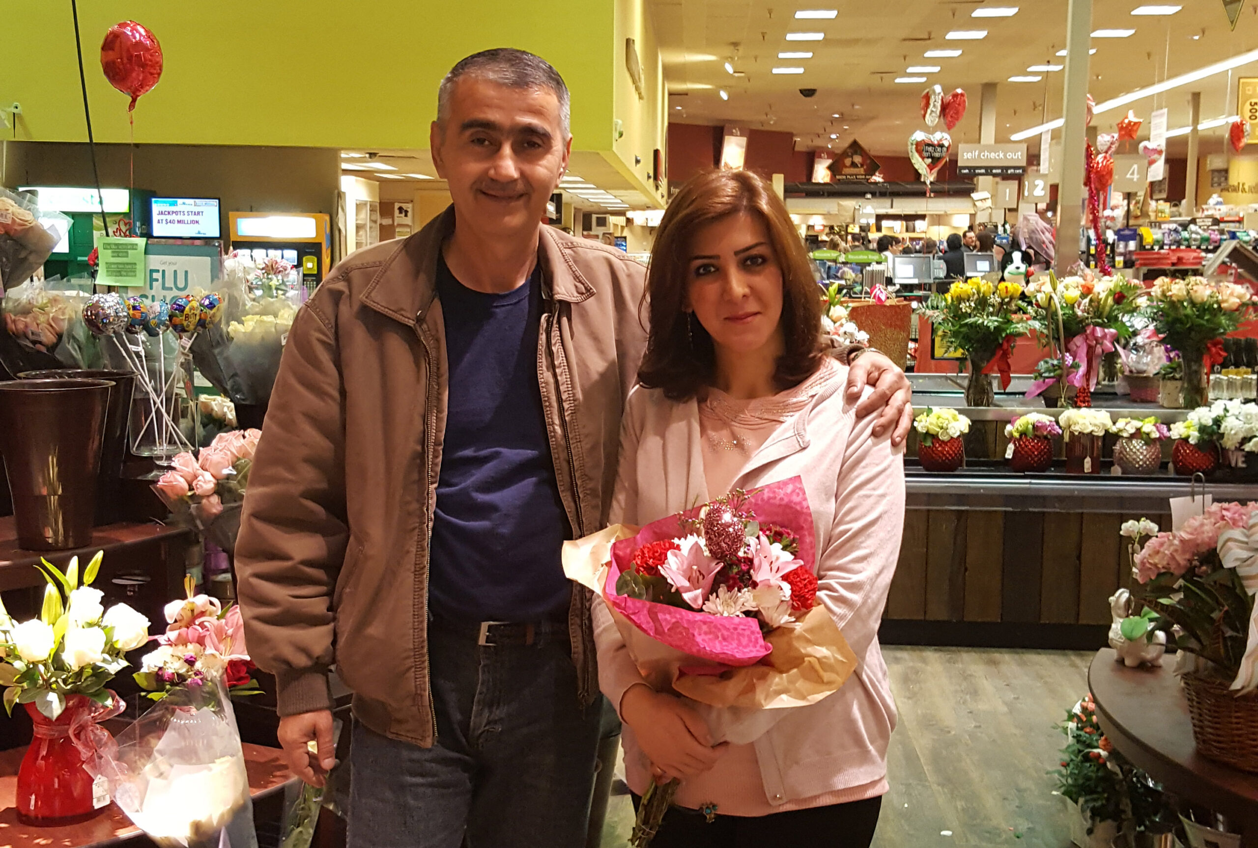 Omar with his arm around Niran