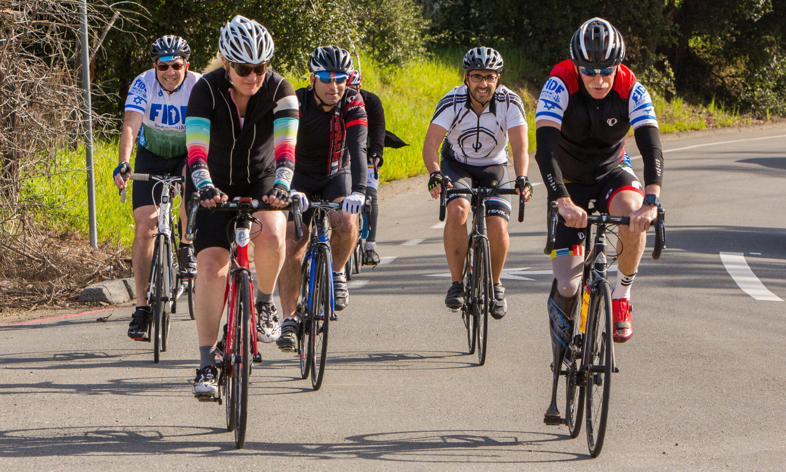a group of men on bicycles