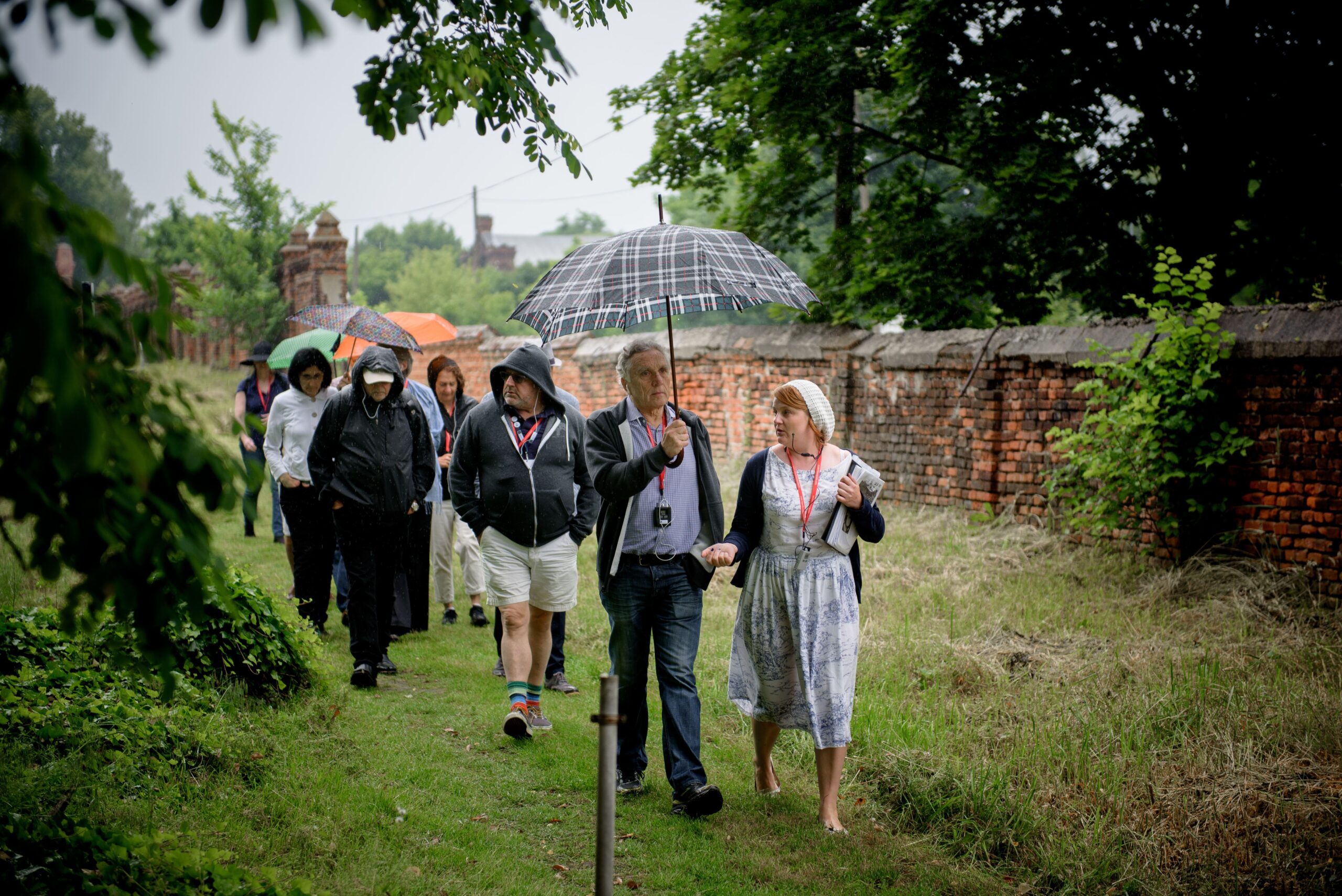 Moses Libitzky and a guide lead participants from the East Bay Federation trip through the Jewish cemetery on Lodz, Poland. (Photo/Courtesy Taube Philanthropies-Maciek Jazwiecki)