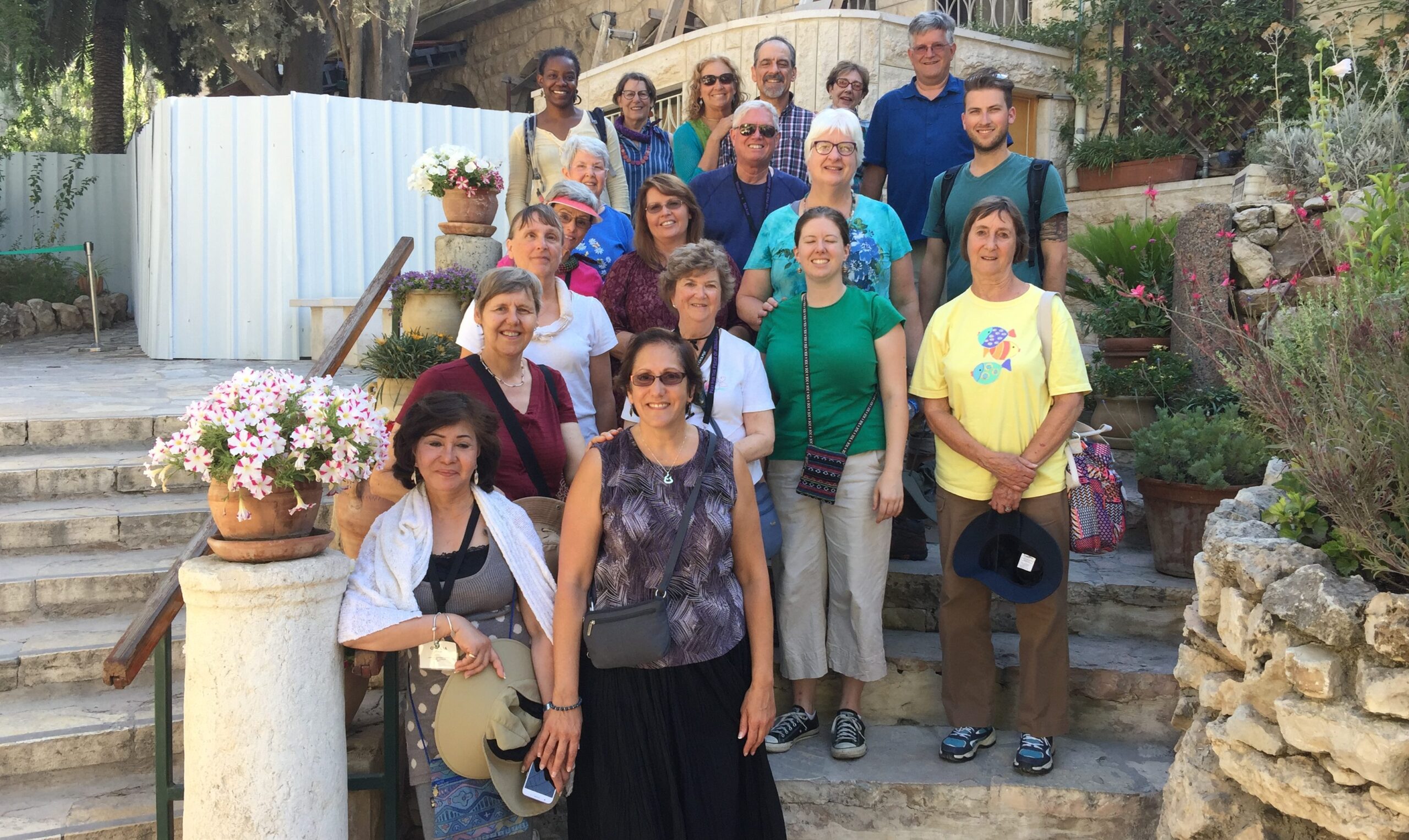 Seema poses for a big group picture in the sunlight with her whole tour group