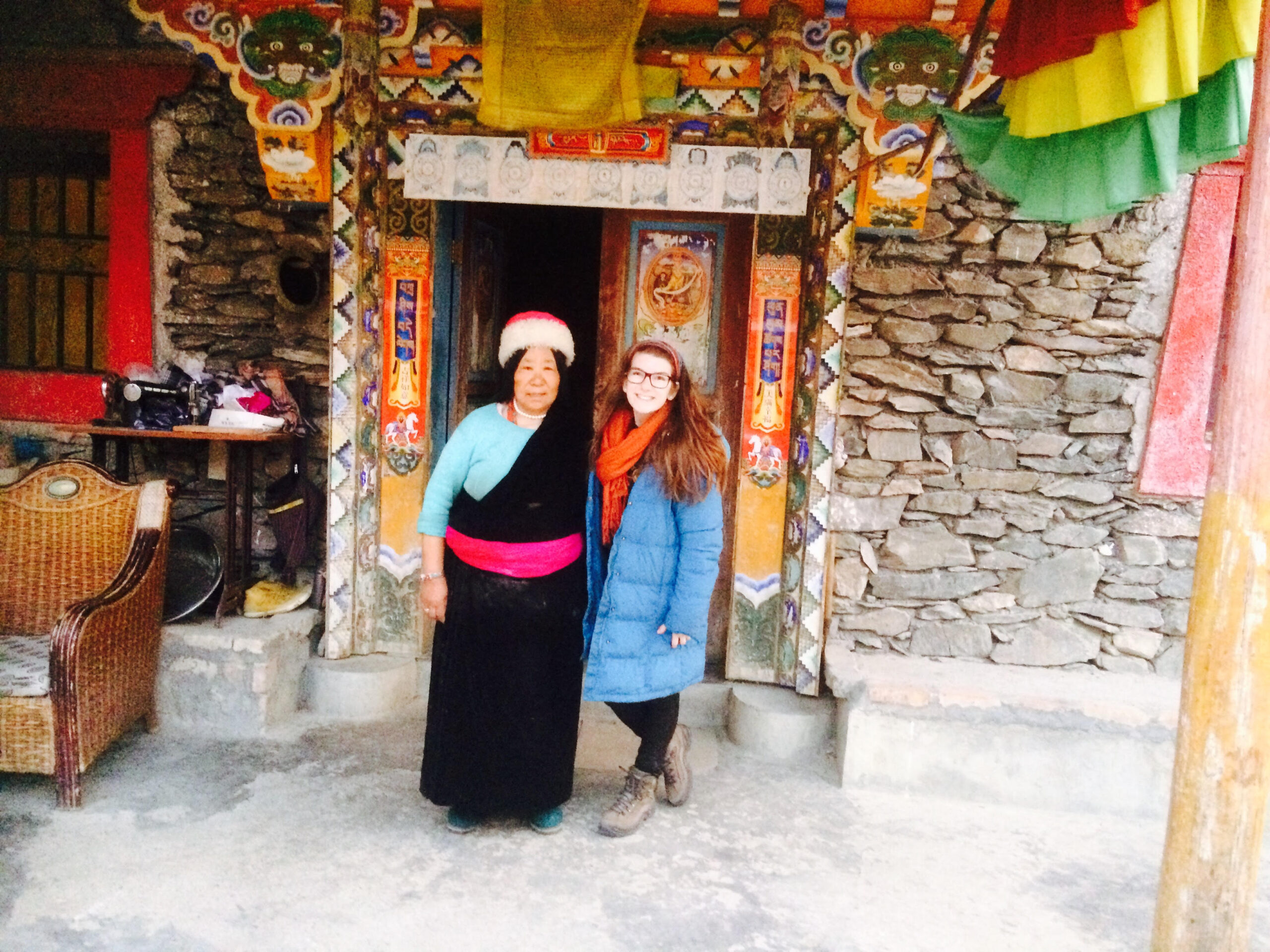 Izzy Ullmann with the matriarch of a Tibetan family that helped her find a way to make Shabbat in China