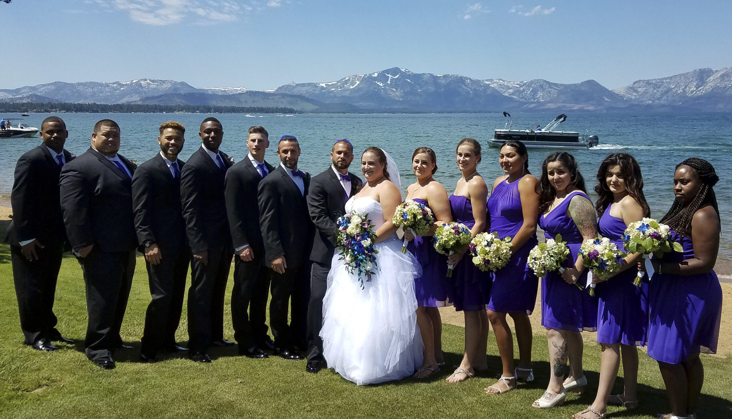 Jon and Amanda (Lafferty) Zrihen with their wedding party at their Lake Tahoe wedding