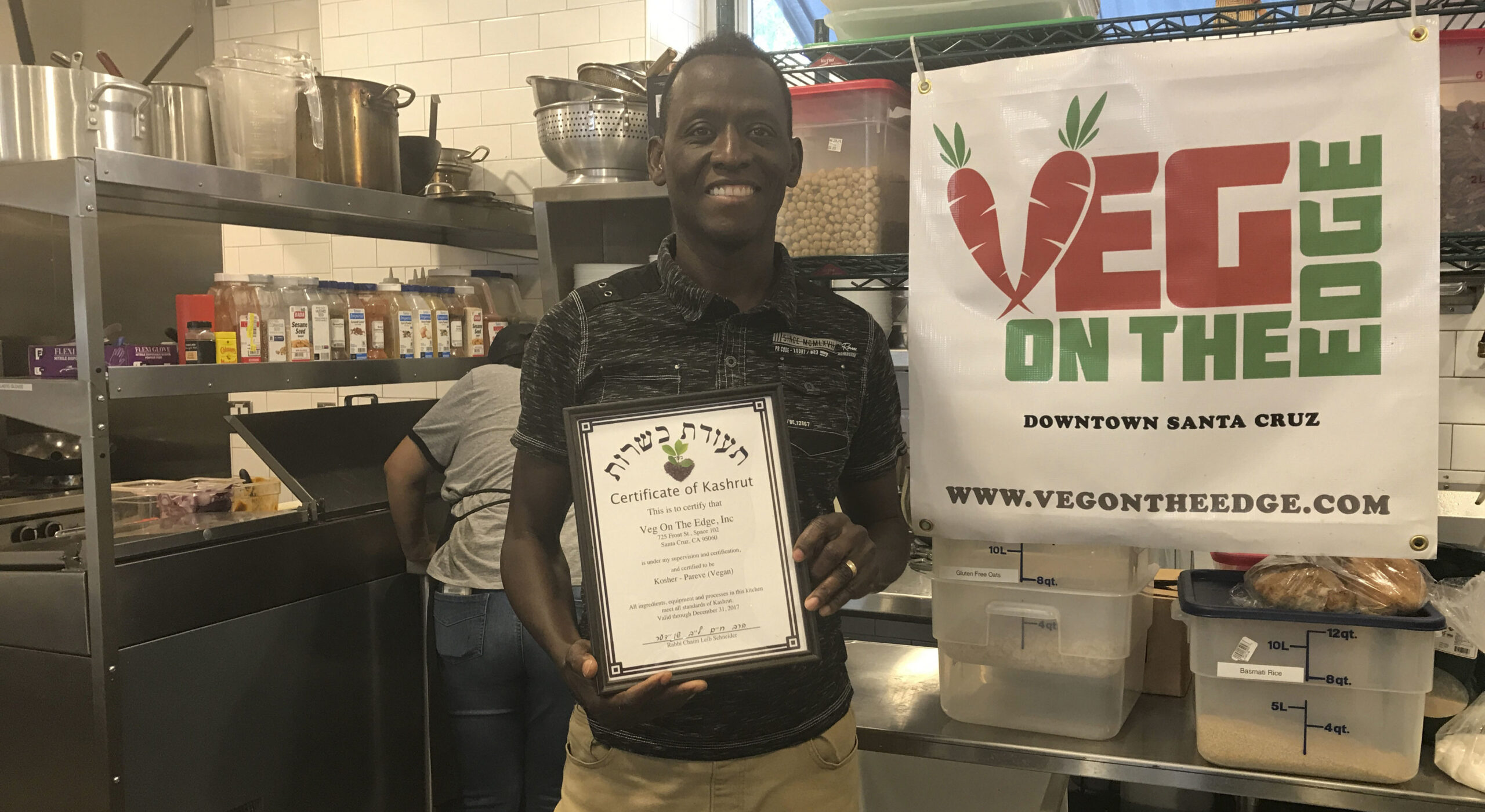 Akindele Bankole in his restaurant in downtown Santa Cruz (Photo/Alix Wall)