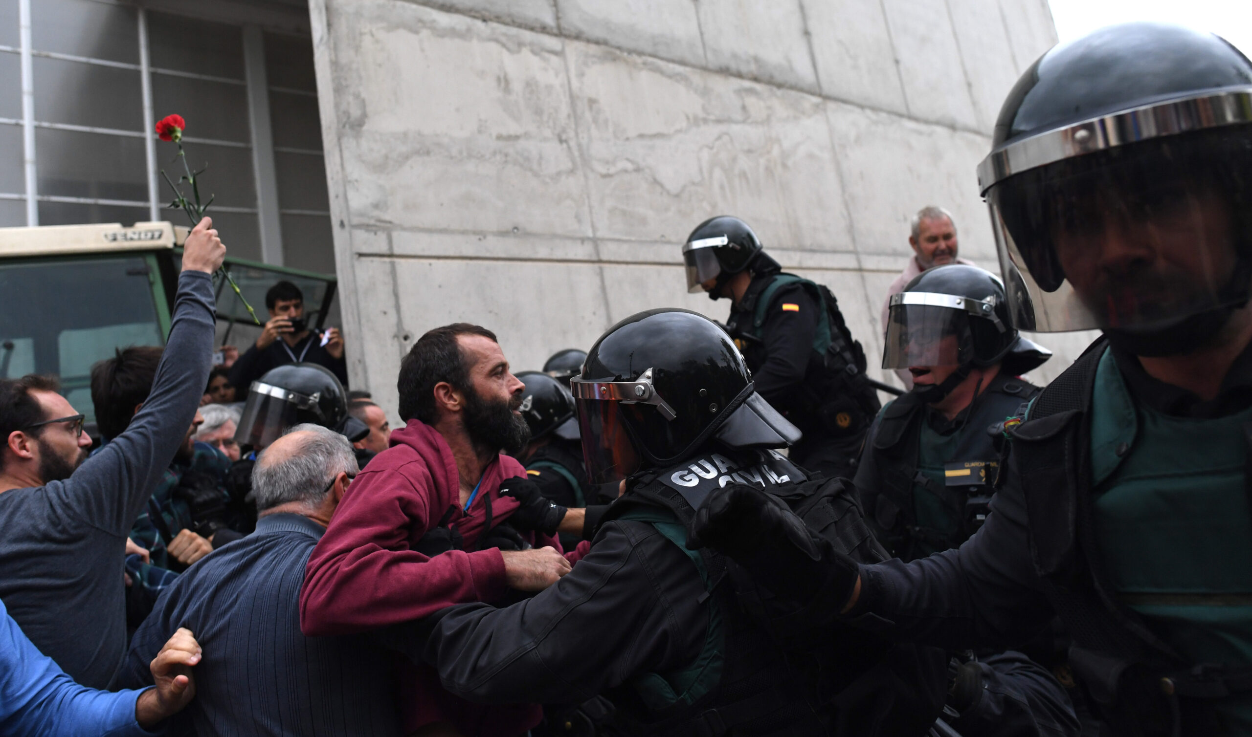 Spanish police dispersing a crowd of Catalonian voters in Sant Julia de Ramis, Spain, Oct. 1, 2017, amid a regional vote for independence declared illegal by the Spanish government. (Photo/JTA-David Ramos-Getty Images)