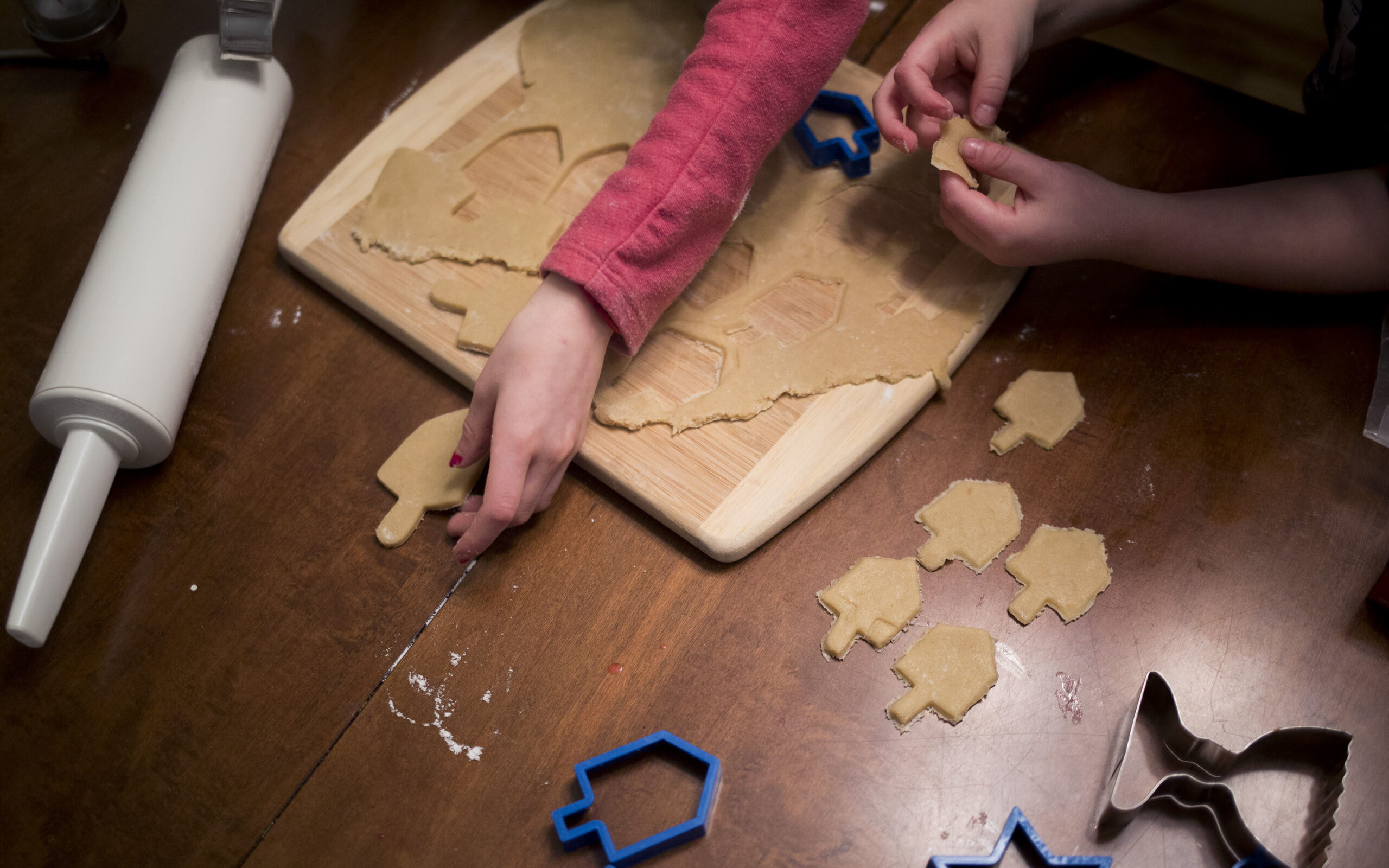 Bake-offs can add some spark to a Hanukkah party. (Photo/JTA-Brianna Soukup-Portland Press Herald-Getty Images)