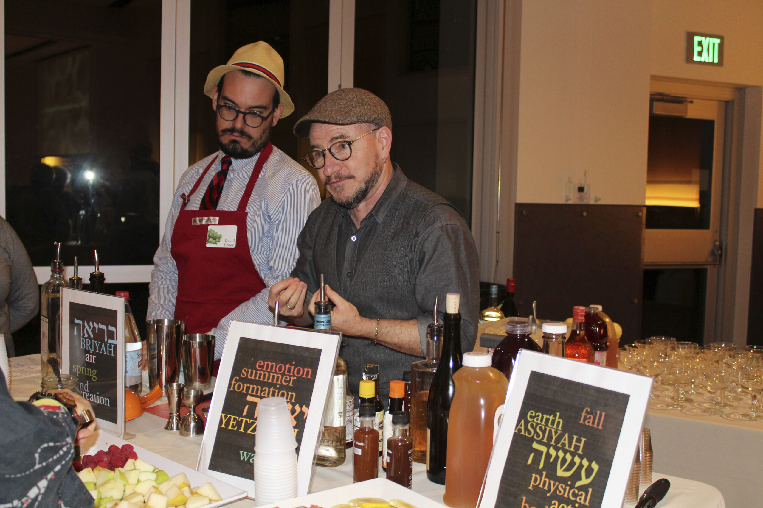 Jhos Singer (right) uses alchemy to mix up original drinks. (Photo/Shayna Dollinger)