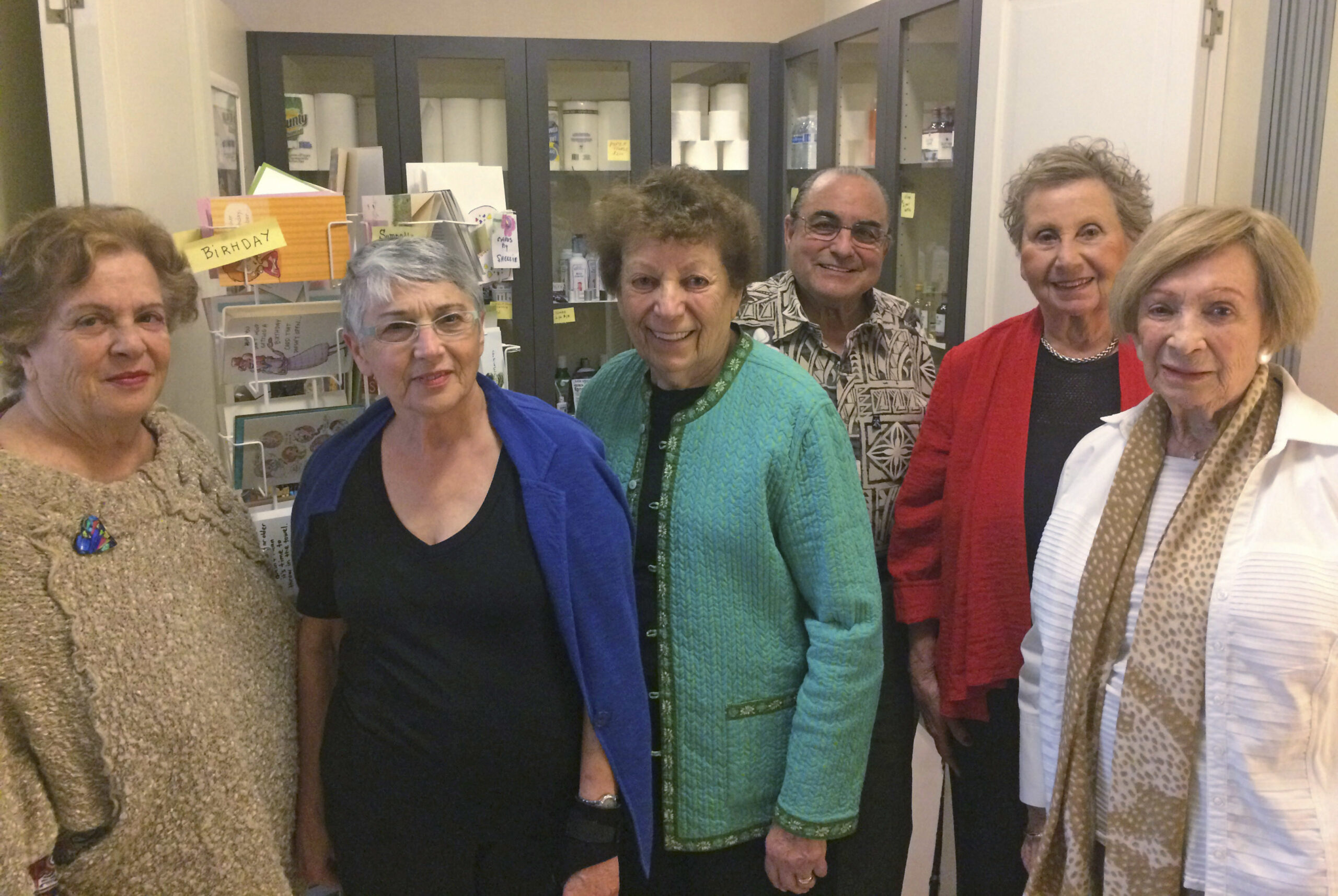 (From left) Ellen Rubinchik, Jean Myers, Shirley Milenko, Harry Rubinchik, Carole Stein and Zdenka Levy in front of This and That (Photo/Rob Gloster)