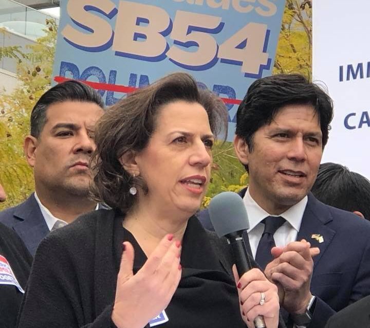 Rabbi Mona Alfi speaking in Sacramento at a protest of U.S. Attorney General Jeff Sessions' visit to the city. (Photo/Facebook-Rabbi Mona Alfi)