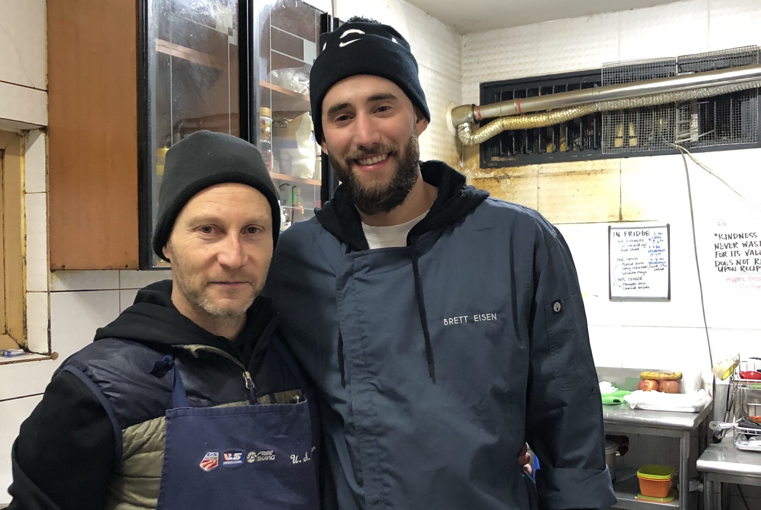 Brett Eisen (right) and Adam Sacks take a break from cooking at the Winter Olympics. (Photo/Courtesy Brett Eisen)