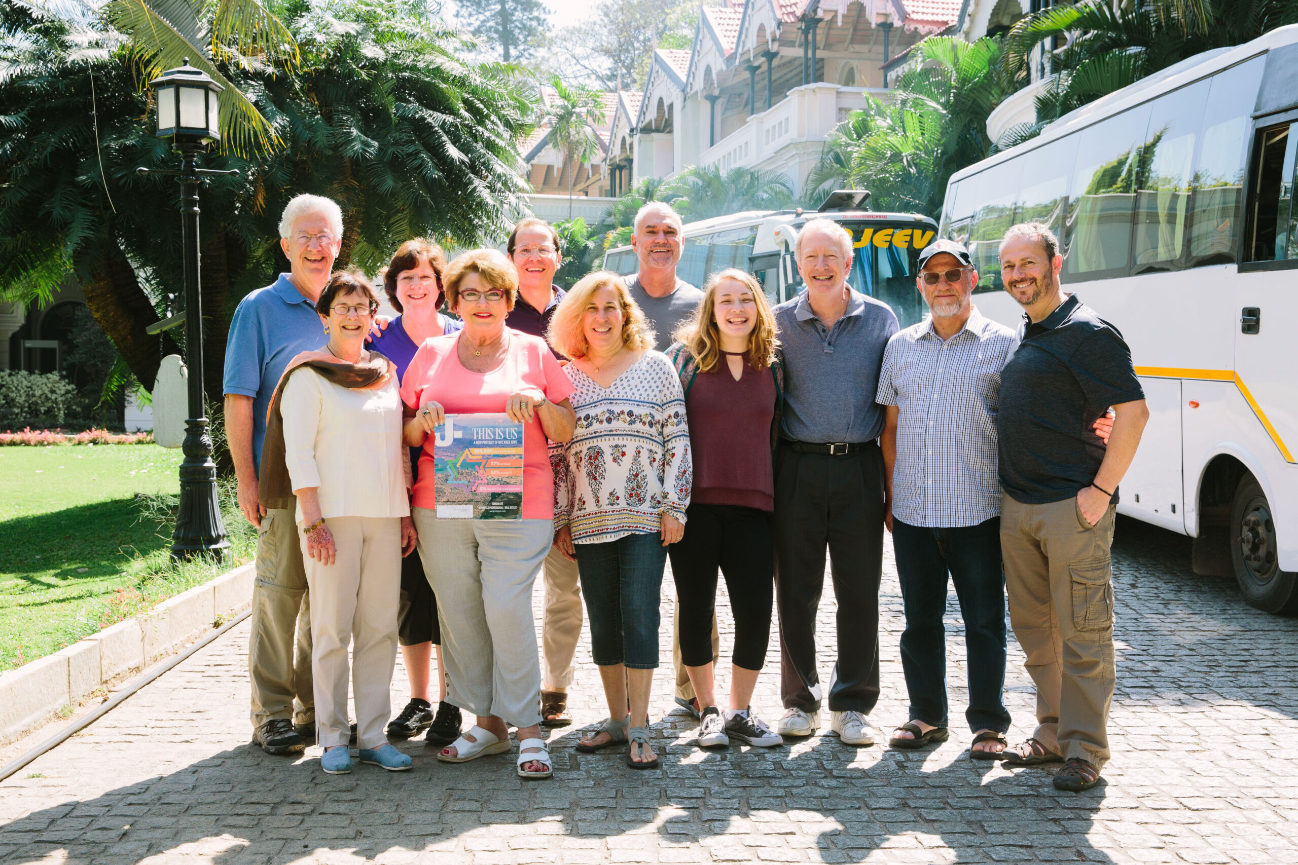 Carol Weitz (pink top, holding an issue of J.) with her AJWS delegation in India