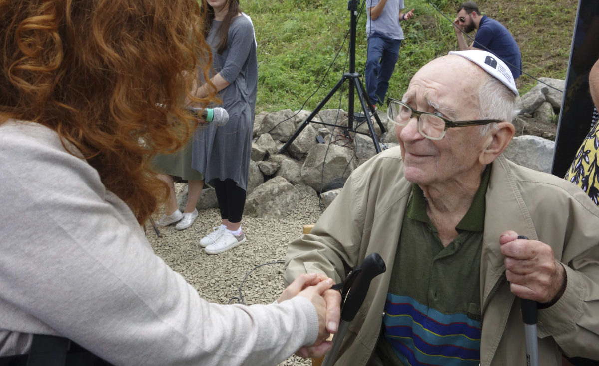 A 93-year-old witness spoke at the unveiling about being a teenager when the Nazis used Kroscienko as a mass grave. (Photo/Jesse Mintz-Roth)