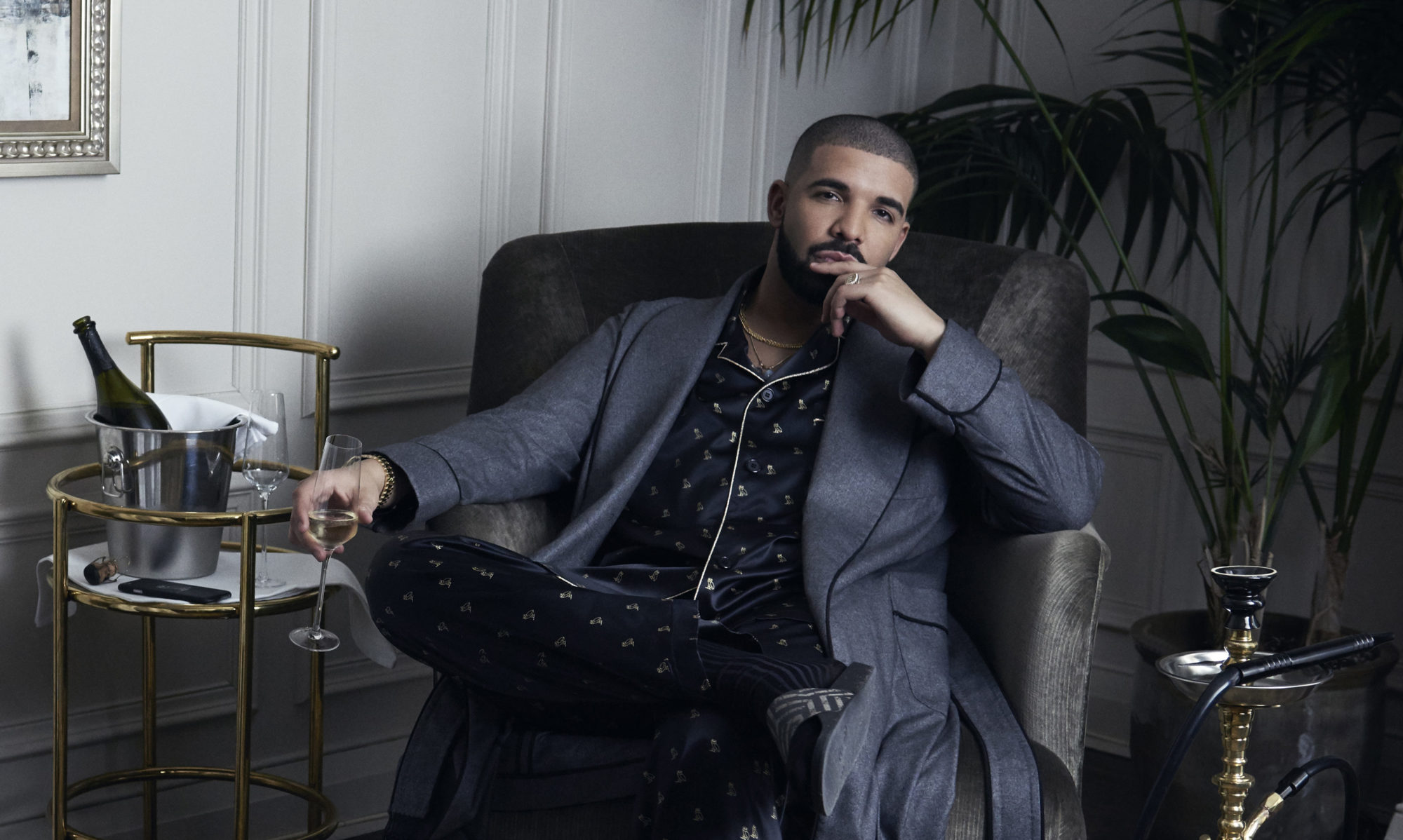 Drake gets comfy in an armchair