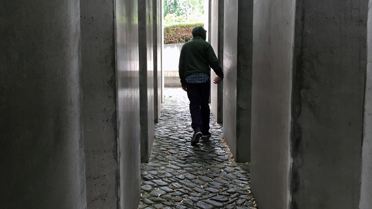 A teenager visiting the Berlin Holocaust Memorial (Photo/Julie Levine)