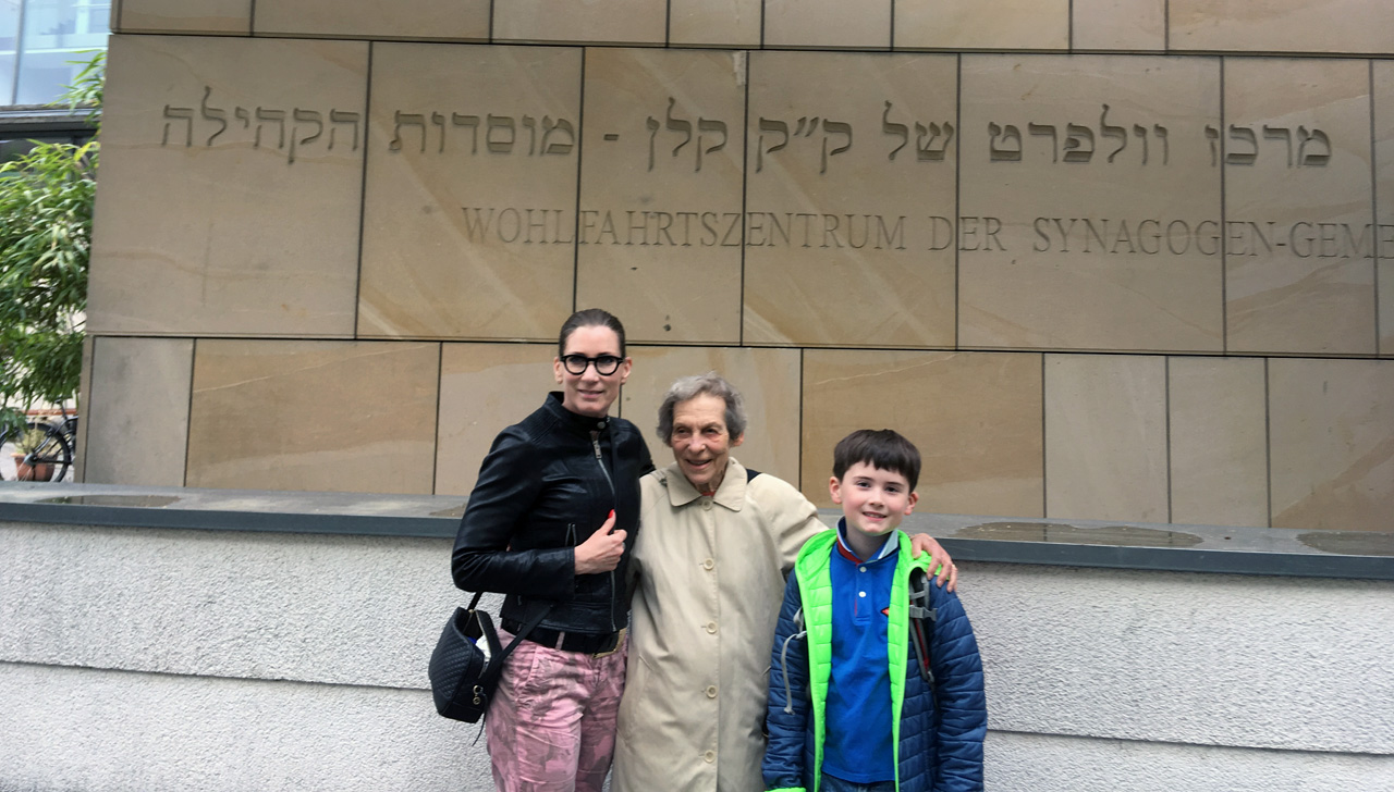 (From left) Andrea Trippen, Marlene Straus and Jacob Trippen in front of the Jewish preschool, Jewish senior housing and JCC in Cologne, Germany