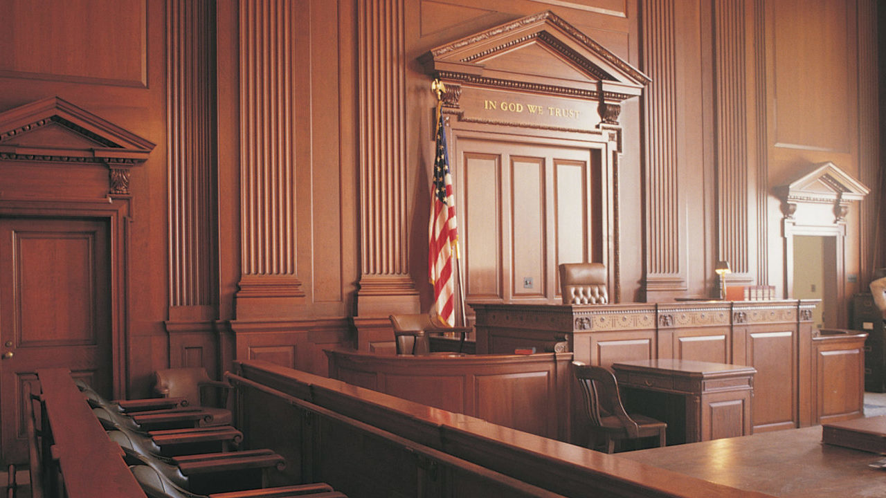 interior of a wood-paneled courtroom