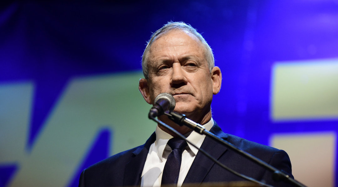 Blue and White party leader Benny Gantz speaks at a demonstration held by Israeli opposition parties outside the Tel Aviv Museum, May 25, 2019. (JTA/Tomer Neuberg/Flash90)
