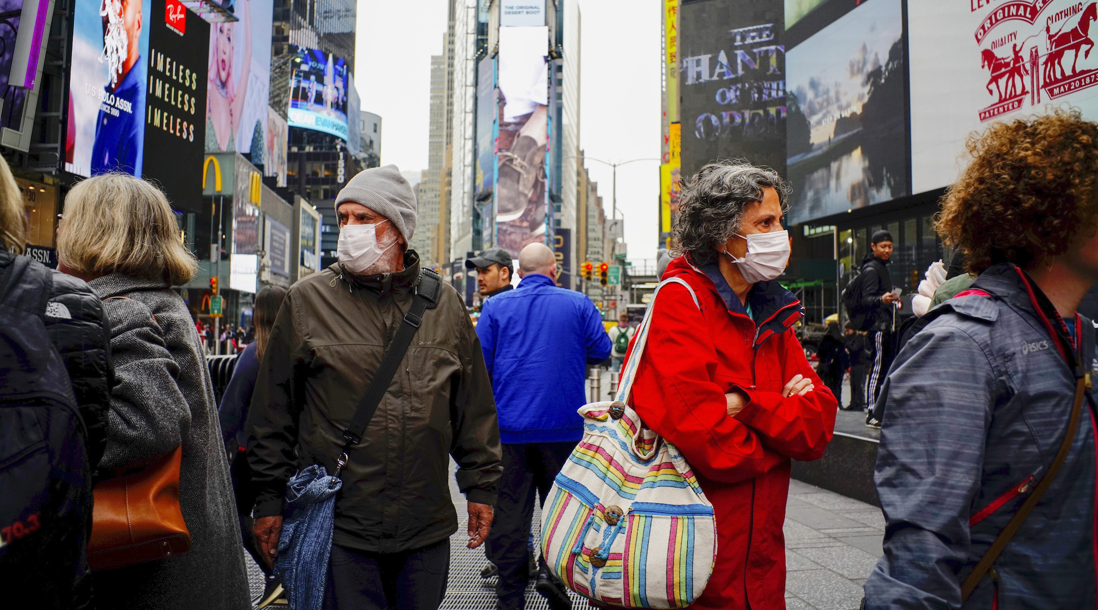 People wear face masks in Times Square in New York City, March 3, 2020, after the city confirmed cases of the rapidly spreading coronavirus. (Photo/JTA-Eduardo Munoz-VIEWpress via Getty Images)