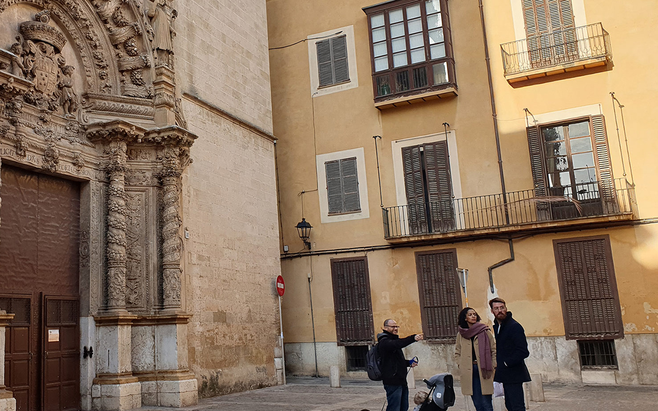 Dani Rotstein, pointing, explains to German tourists about a church that used to be a synagogue in Palma de Mallorca, Spain, Feb. 11, 2019. (Photo/JTA-Cnaan Liphshiz)