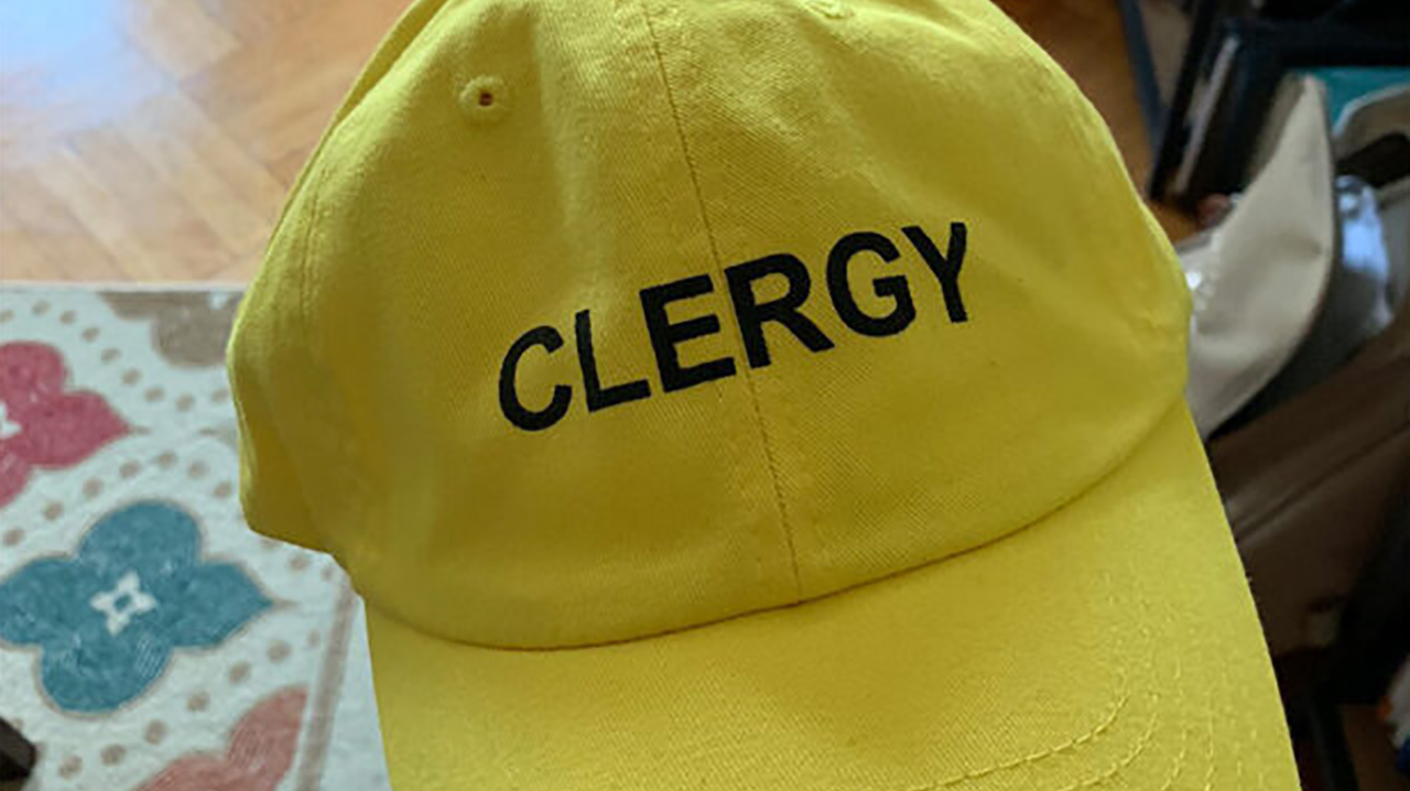 Rabbi Emily Cohen has a yellow hat emblazoned with the word "clergy" ready to wear to protests, where she plans to help deescalate possible violent situations. (Photo/Courtesy Cohen)