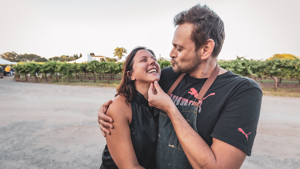 Elinor Nahmani (left) and Arkadi Kluger, owners of Olive catering company, at a Longboard Vineyards event.