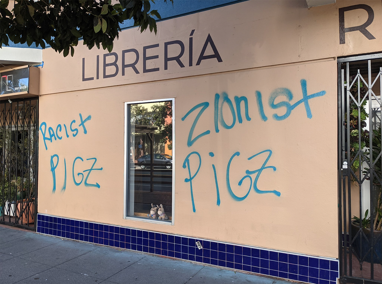Graffiti on the wall of Manny’s café in San Francisco's Mission District, June 6, 2021. (Photo/Steven Buss)