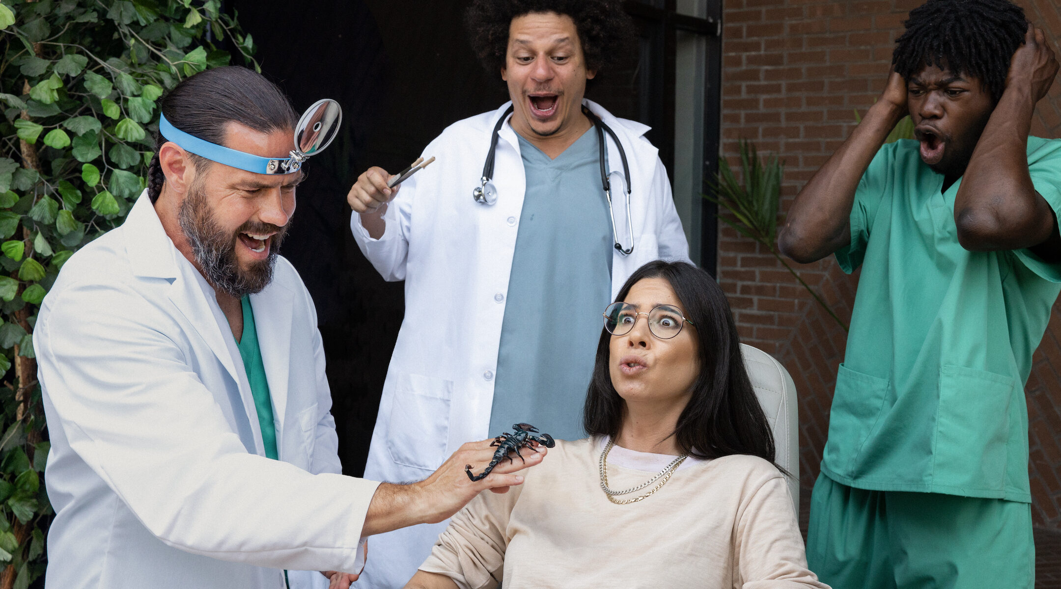 Rachel Wolfson in an uncomfortable scene with, from left, Chris Pontius, Eric Andre, and Eric Manaka — and a scorpion — in "Jackass: Forever." (Photo/JTA-Paramount Pictures)