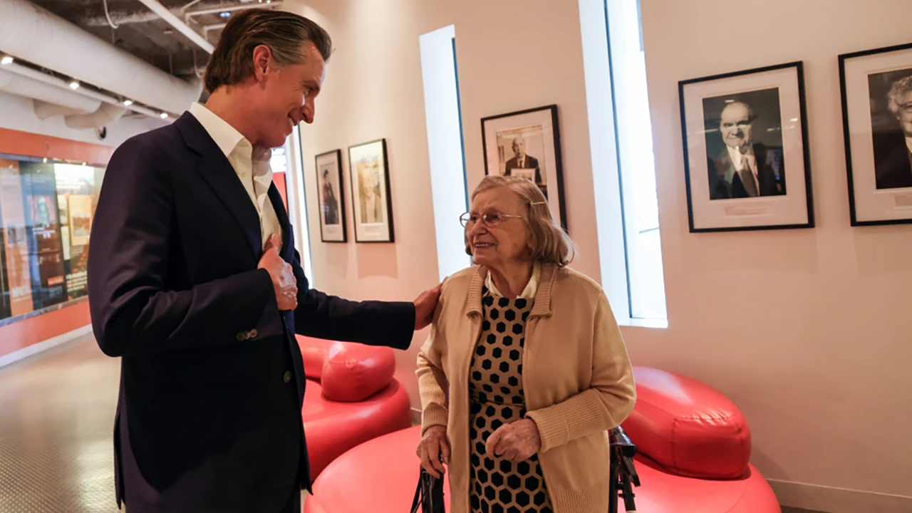 Governor Gavin Newsom talks with Holocaust survivor Martha Sternbach at the Museum of Tolerance in Los Angeles. (Photo/Courtesy Newsom's office)