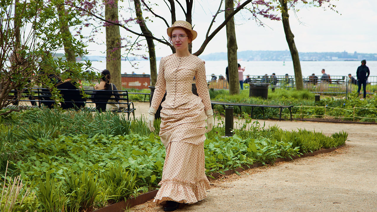 Vi poses in Battery Park in New York City, dressed as her great-great-grandmother Carolina in 1881. (Photo/Courtesy)