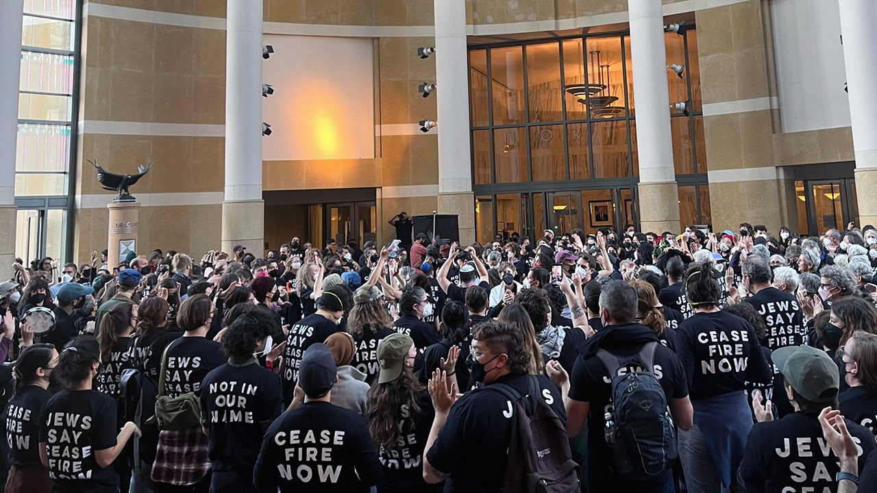 Protesters in the rotunda of the Ronald V. Dellums Federal Building in Oakland wear T-shirts reading "Cease Fire Now," "Jews for a Cease Fire" and "Not in Our Name," Nov. 13, 2023. (Photo/Courtesy-JVP)