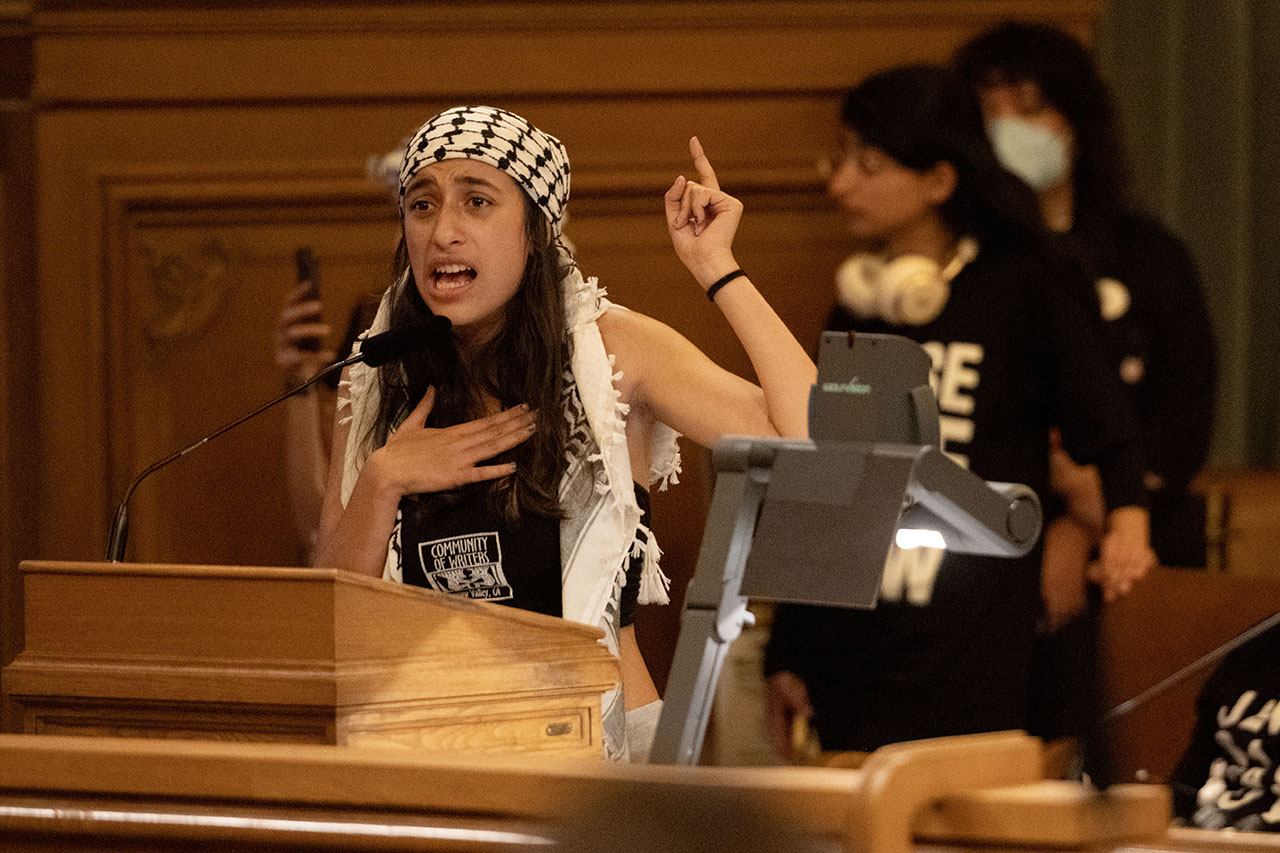 A Palestinian American teenager urges the San Francisco Board of Supervisors to support a resolution calling for a cease-fire in Gaza, Dec. 5, 2023. (Photo/Aaron Levy-Wolins)