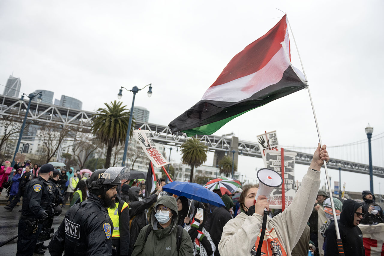 Demonstrators call for a cease-fire in Gaza, protesting the USNS Harvey Milk as it arrives in San Francisco before its maiden voyage to the Middle East, March 29, 2024. (Photo/Aaron Levy-Wolins)