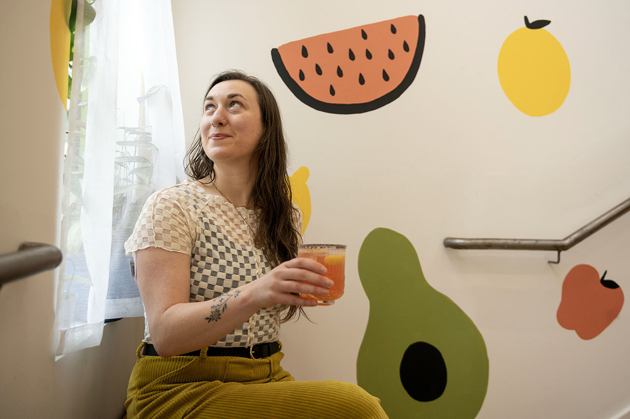 Lila Volkas with a Hamantaschen Spritz mocktail at her studio in Oakland, March 12, 2024. (Photo/Aaron Levy-Wolins)