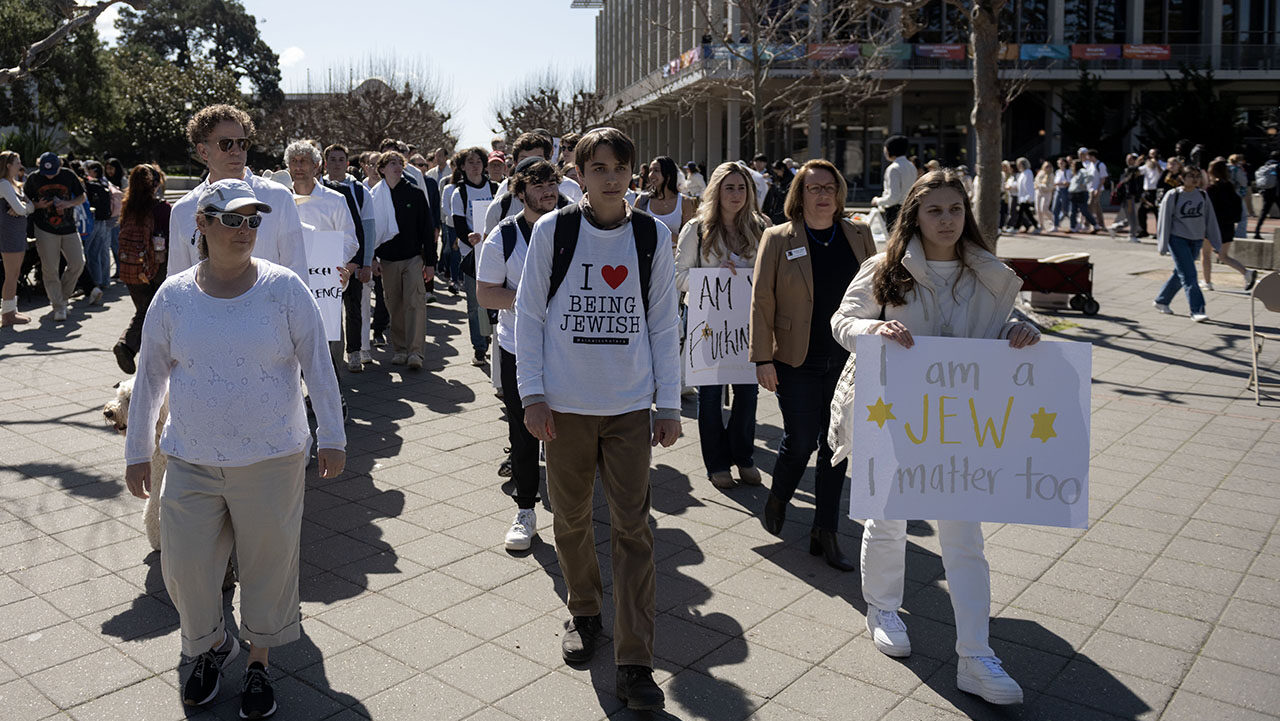 Demonstrators approach Sather Gate at UC Berkeley during a protest against antisemitism on campus, March 11, 2024. (Aaron Levy-Wolins/J. Staff)