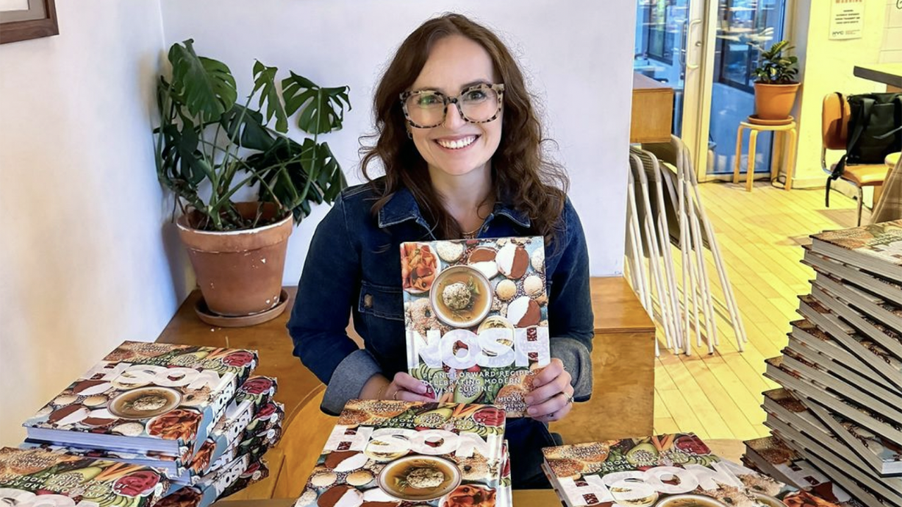 J. recipe columnist Micah Siva with her new book, "Nosh." (Photo/Courtesy Siva via Instagram)
