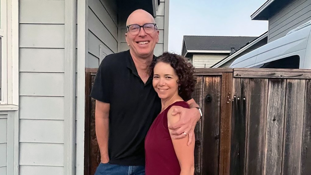 Amy Ettinger, shown with her husband Dan White, wrote about ice cream, mah-jongg and her mother's kugel recipe. (Photo/JTA-Courtesy Dan White via X)