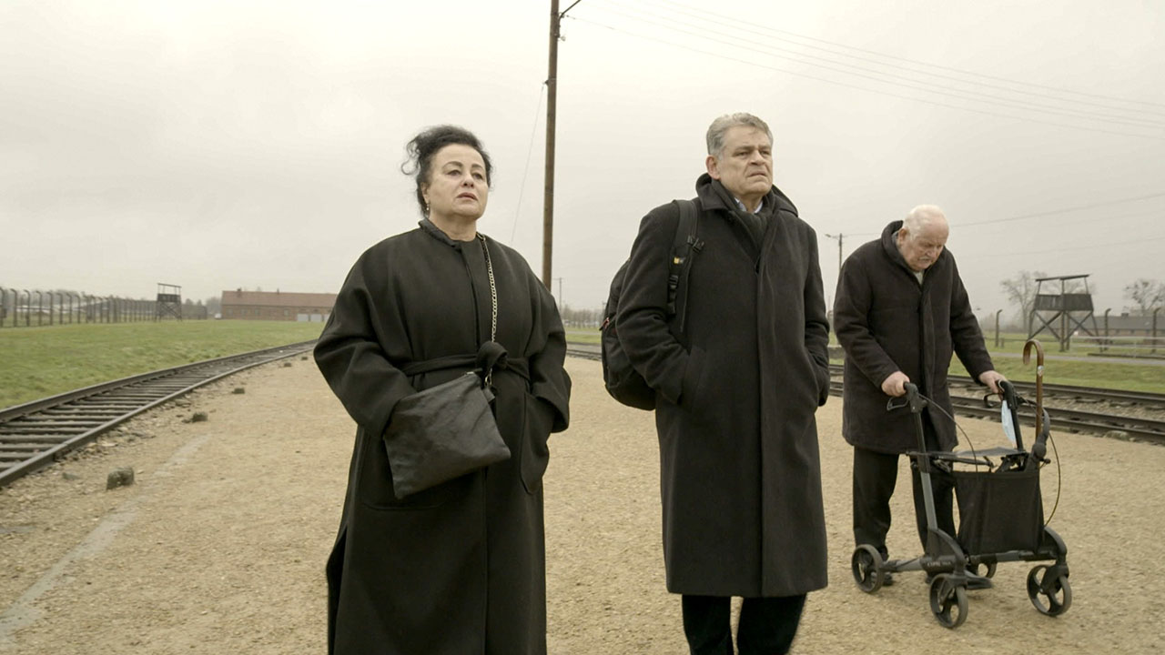 Maya Lasker-Wallfisch, Kai Höss and Hans-Jurgen Höss visit Auschwitz. (Photo/Courtesy Warner Bros. Pictures)