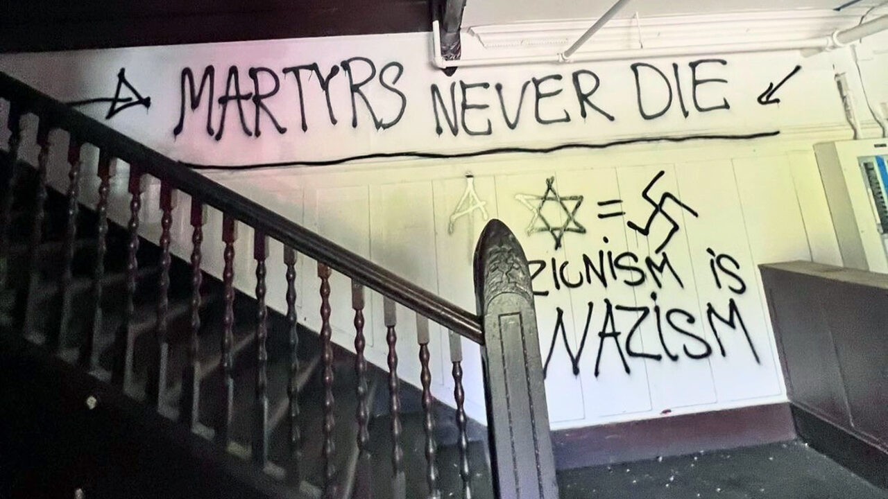 Graffiti reading "Martyrs never die" and "Zionism is Nazism" was found inside a vacant building owned by UC Berkeley that was taken over by protesters in May 2024. (Photo/Courtesy JCRC)