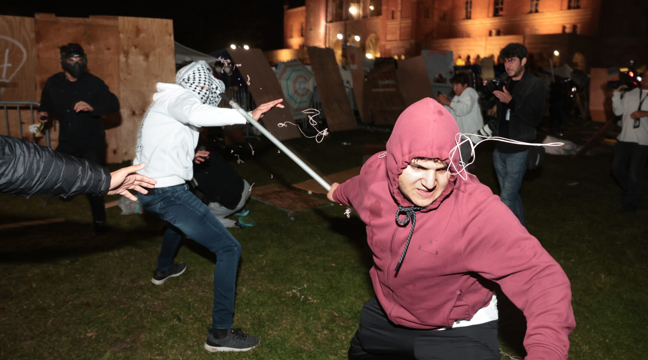 Pro-Palestinian and pro-Israel protesters clash during violence at an encampment at UCLA early in the morning of May 1, 2024. (Photo/JTA-Wally Skalij-Los Angeles Times via Getty Images)