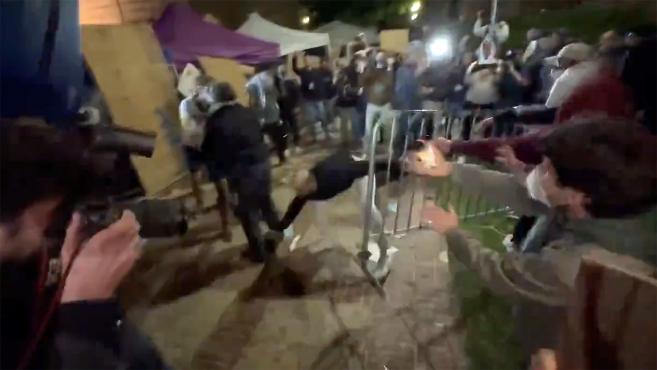 Pro-Israel and pro-Palestinian protesters clash at UCLA in video circulating on Twitter. (Screenshot/Twitter via @muhammadasifat)