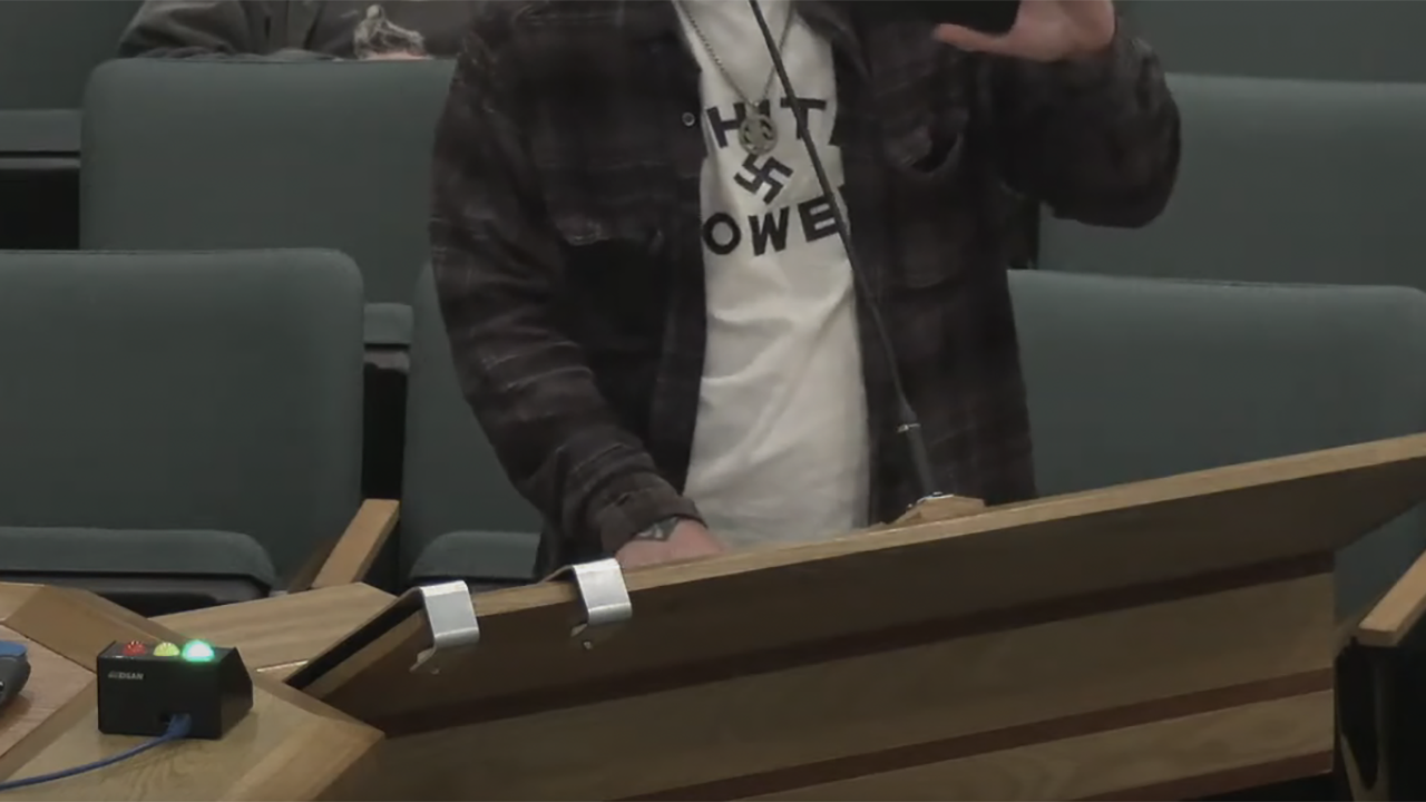 A man in a T-shirt with a swastika and the phrase "white power" on it speaks during the Feb. 20, 2024 Walnut Creek City Council Meeting. (Screenshot/City of Walnut Creek via YouTube)