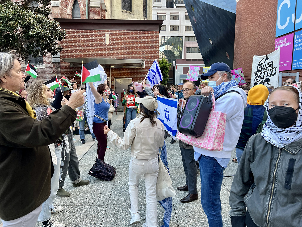 Pro-Palestinian and pro-Israel protesters face off outside of the Contemporary Jewish Museum, June 6, 2024. (Photo/Andrew Esensten)