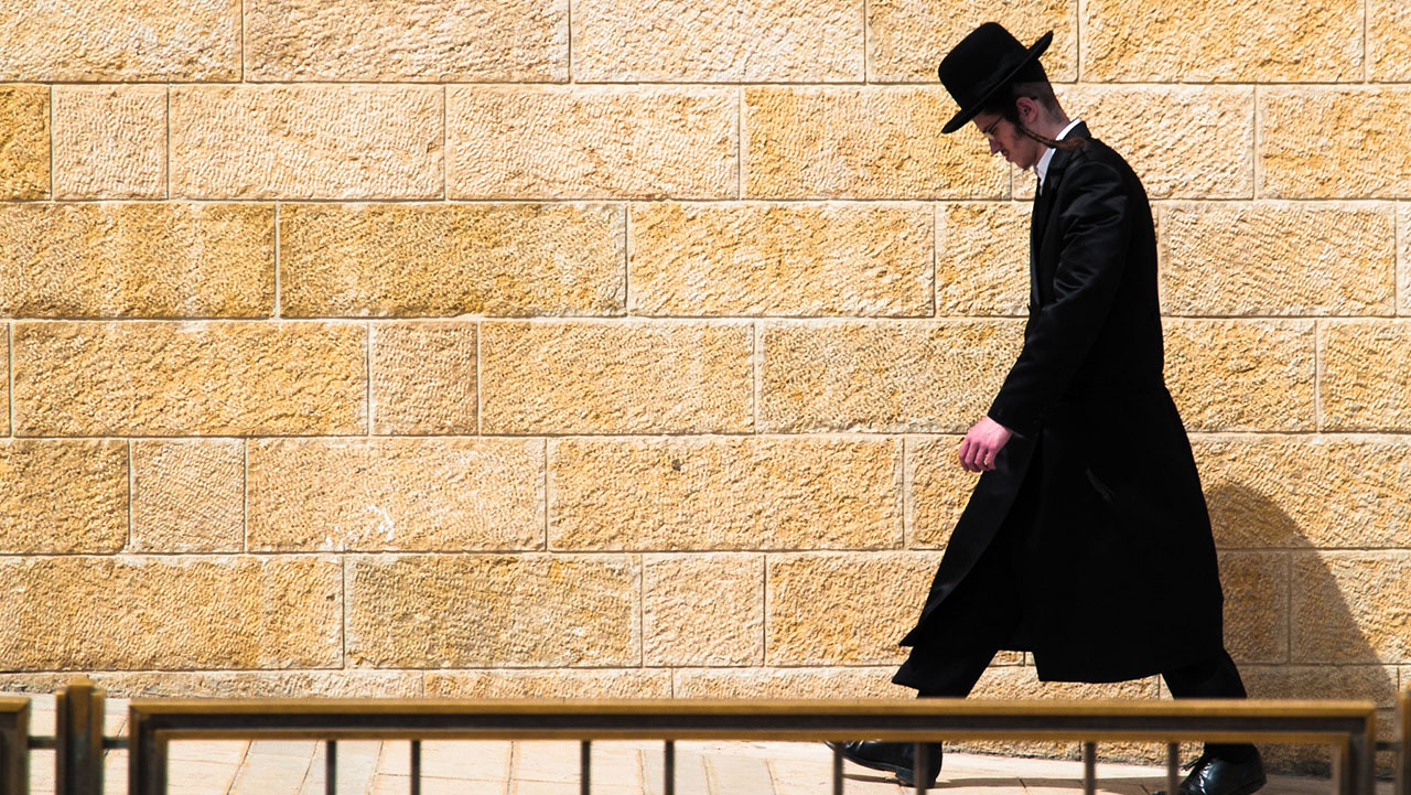 A Haredi Jew walks in Jerusalem in 2012. (Dan Zelazo via Flickr CC BY-NC-SA 2.0)