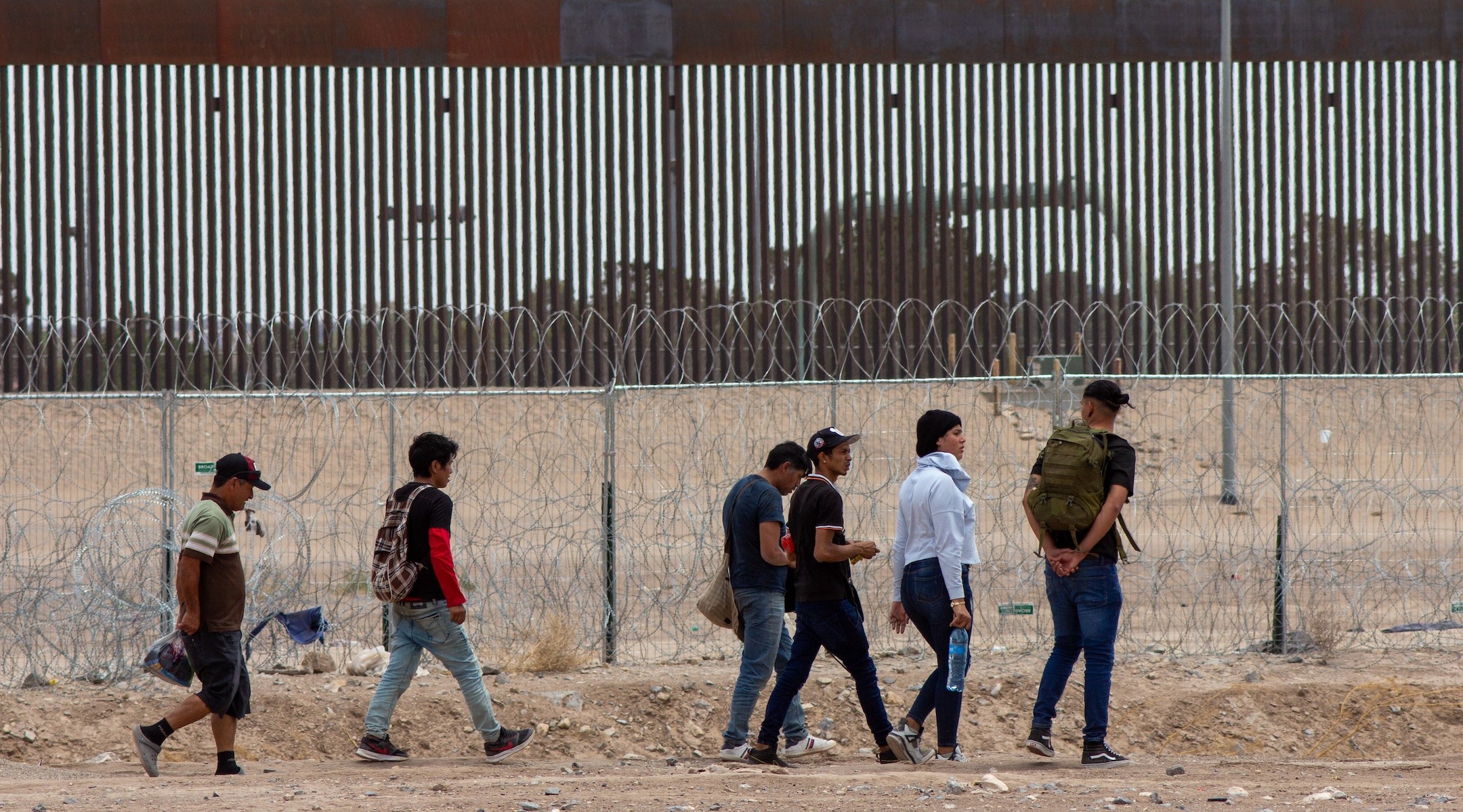 Migrants at the U.S.-Mexico border on the day President Joe Biden signed a new executive order restricting entry for asylum seekers, June 4, 2024, in Ciudad Juarez, Mexico. (Photo/JTA/David Peinado/Anadolu via Getty Images)