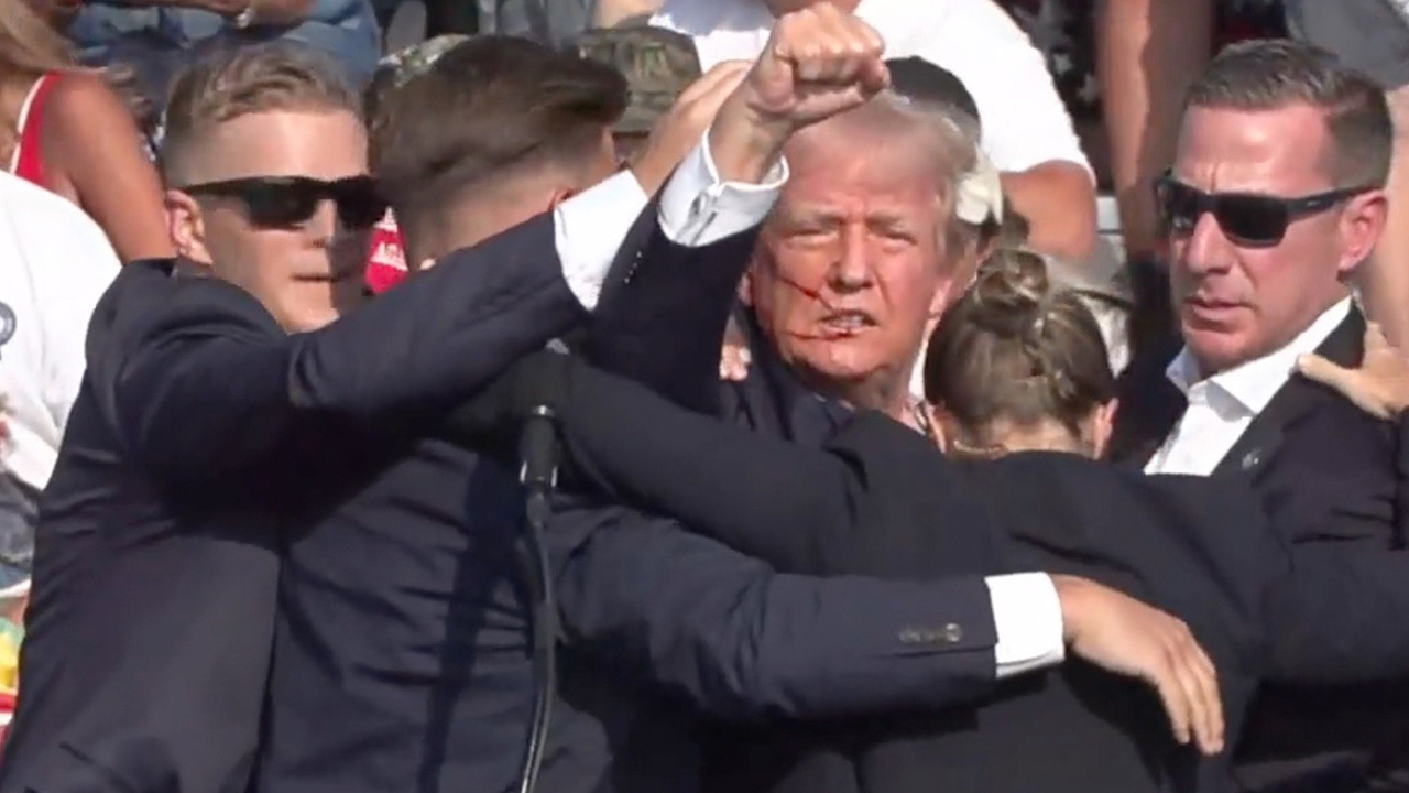 In a screen grab captured from a video, Republican presidential candidate and former President Donald Trump appears to be injured after gunshots were reported at a rally in Butler, Pennsylvania, July 13, 2024. (Anadolu/Getty Images)