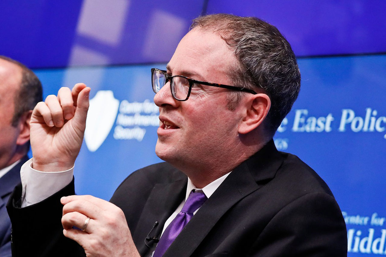 Goldenberg gesticulates as he speaks