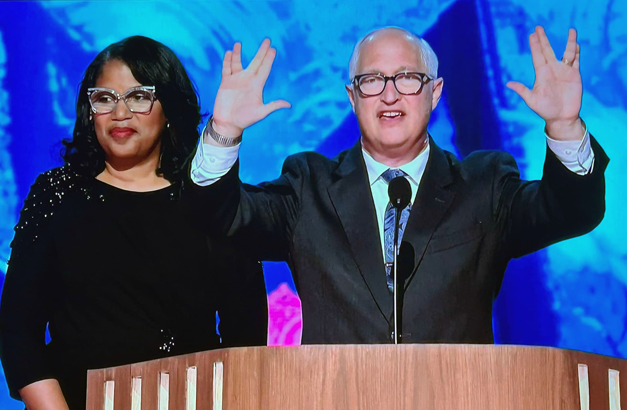 Rabbi Michael Beals holds hands up in the sign of the Priestly Blessing during the closing prayer of the first night of the Democratic Nation Convention in Chicago, Aug. 20, 2024.