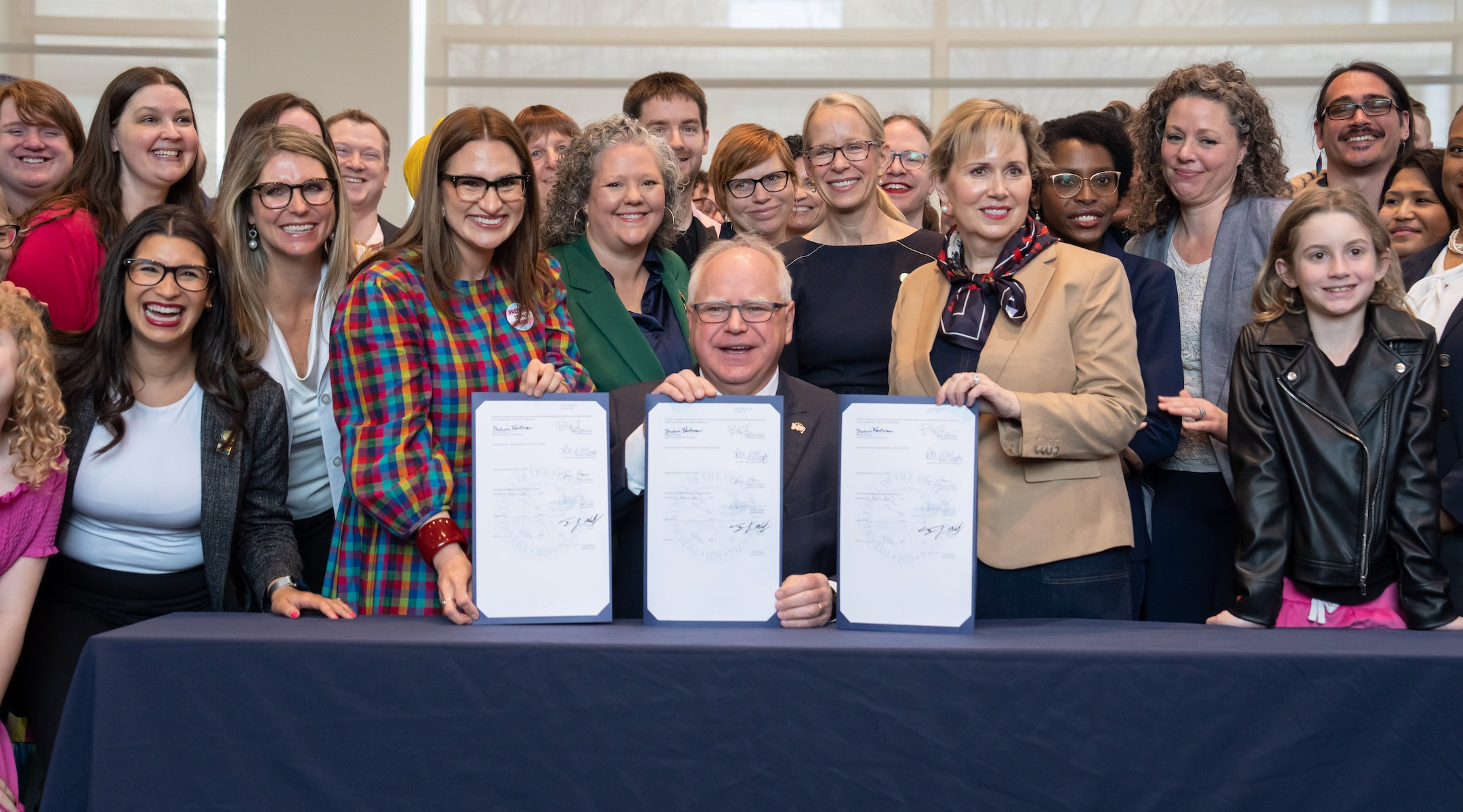 Minnesota Gov. Tim Walz signed a ban on conversion therapy for minors and vulnerable adults and two bills that would make Minnesota a refuge for people traveling for abortion and gender affirming care, Thursday, April 27, 2023, St. Paul, Minn. (Glen Stubbe/Star Tribune via Getty Images)