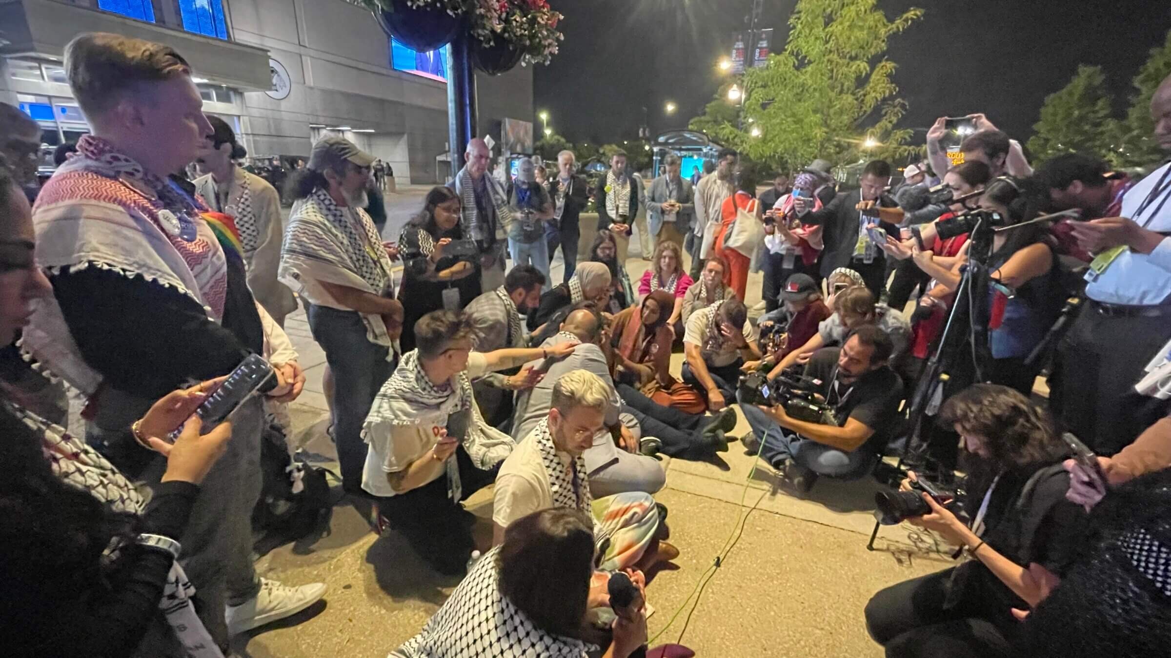 “Uncommitted” delegates to the Democratic National Convention staged a sitin outside the United Center Wednesday night to demand a Palestinian-American be allowed to speak from the main stage. (Jacob Kornbluh/Forward)