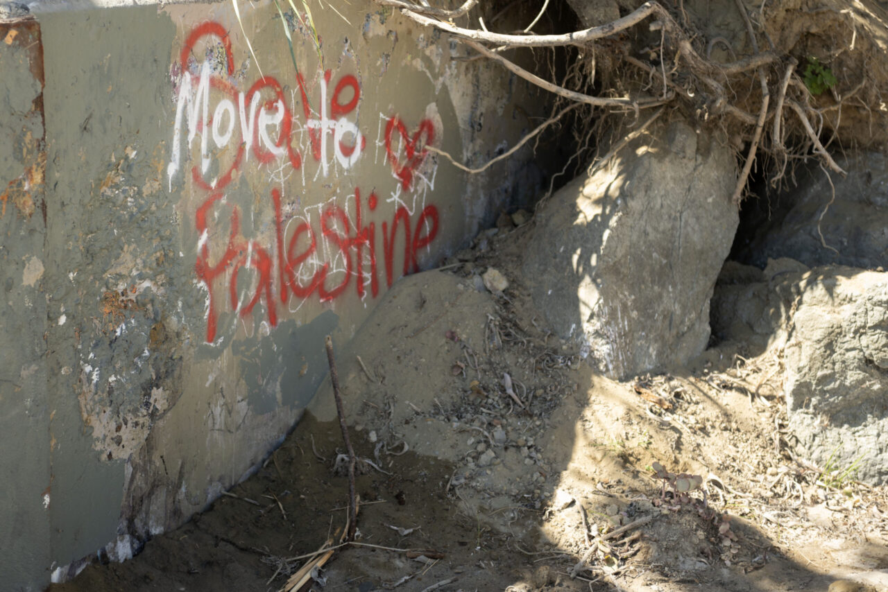 A seawall on the beach in Bolinas, California, reads “Save (covered by 'Move to') Palestine,” Sept. 23, 2024. (Aaron Levy-Wolins/J. Staff)